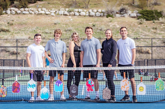 A group of young pickleball enthusiasts showing the social benefits of pickleball