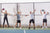 Group of four individuals leaping in excitement on a pickleball court.