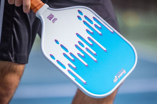A closeup of a pickleball paddle highlighting the texture and build—representing the custom pickleball paddle materials available.