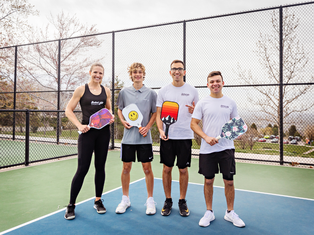 Pickleball Players Holding a pickleball paddle